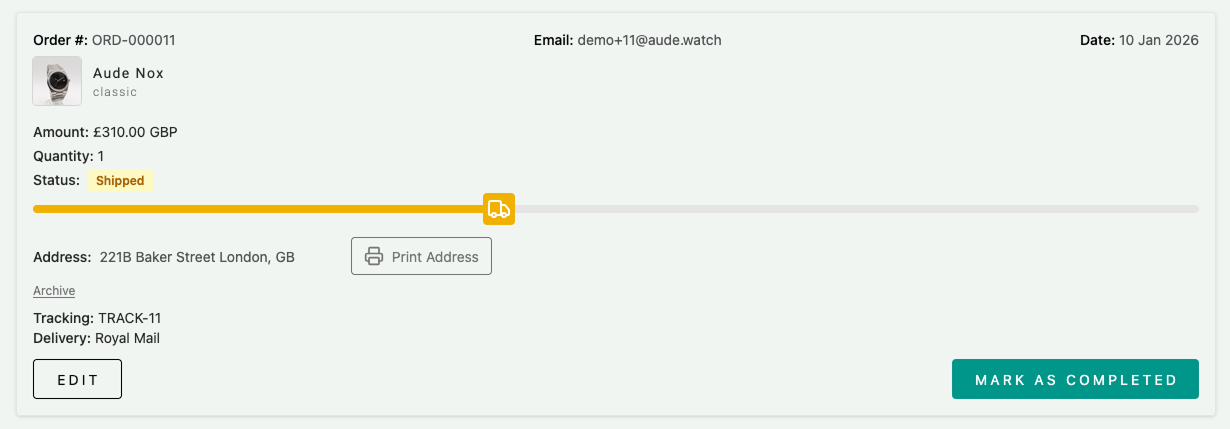AUDE admin order marked as shipped with progress status indicator